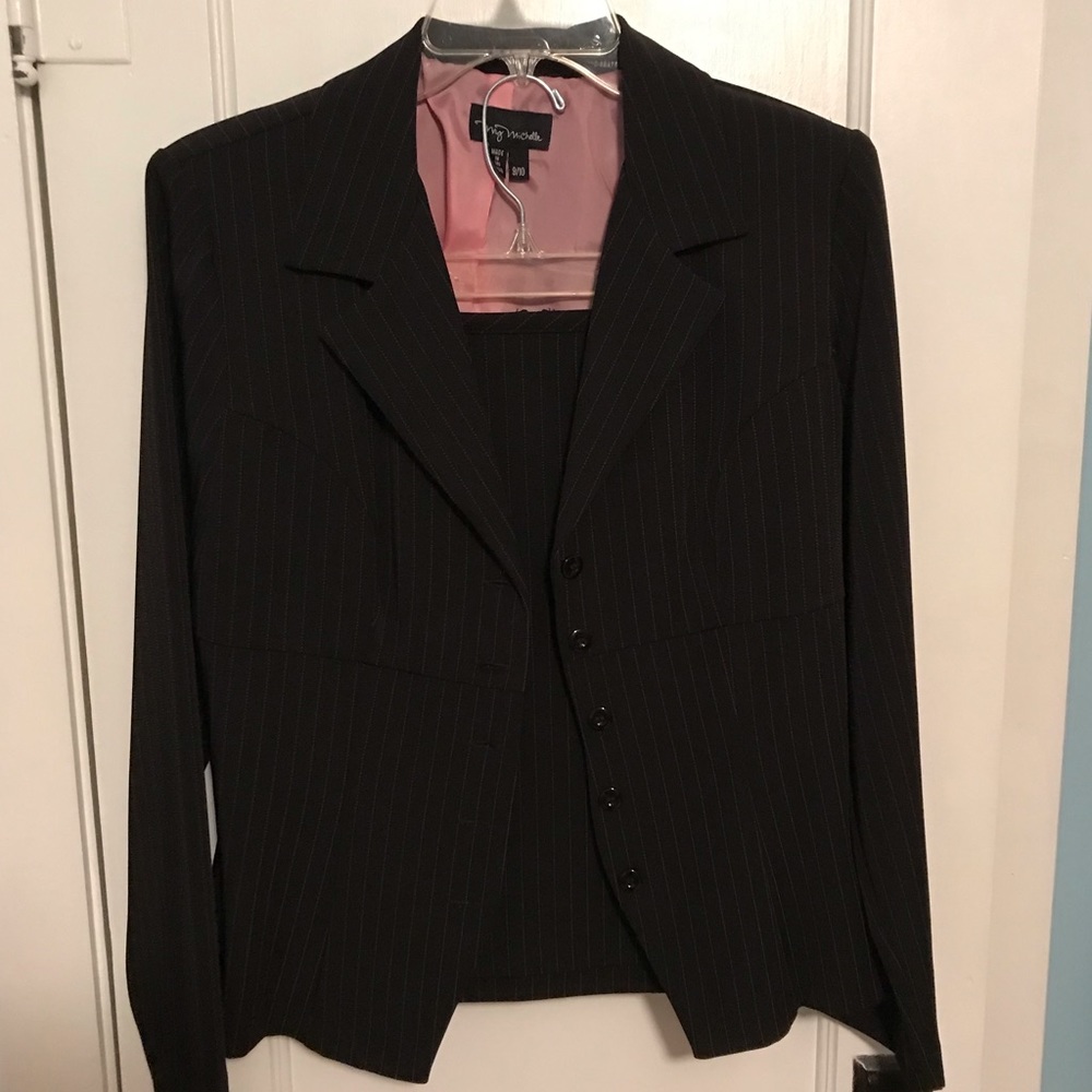 Black and pink pinstripe suit coat and skirt